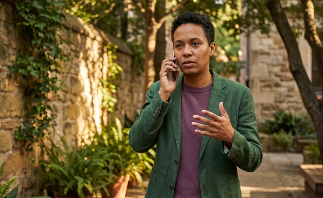 A person explaining a possible unauthorized ACH transfer by phone.