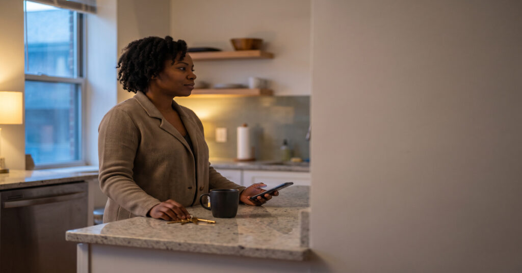 A person adult considers an unexpected federal student loan default status change without showing personal documents.