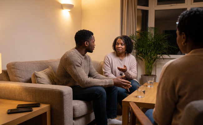 A person adult family members discuss the tradeoffs of federal student loan consolidation.