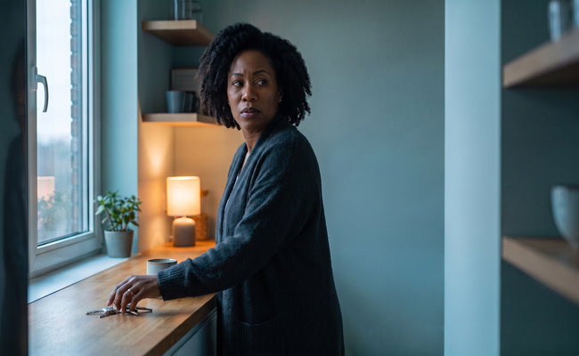 An adult borrower gathers herself before checking whether a student loan tax refund offset affects her situation.