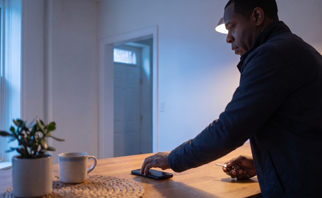 An adult borrower prepares to verify a tax balance before requesting an IRS payment plan.
