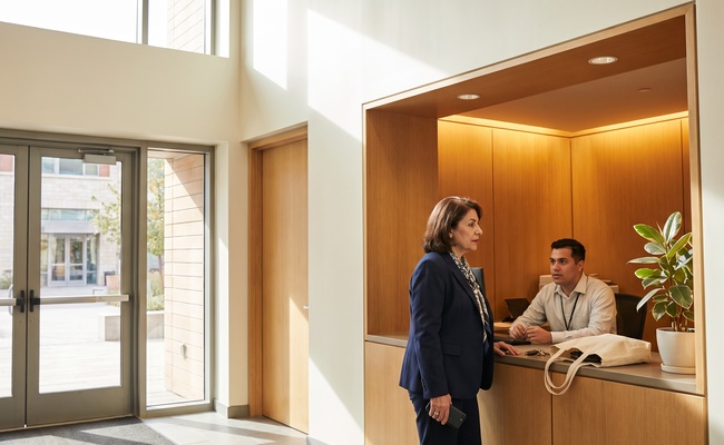 An adult taxpayer discusses possible IRS collection alternatives with a service representative.