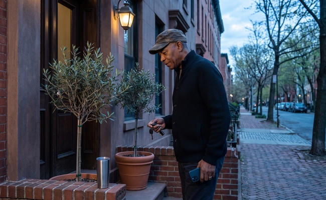 An older adult preserves follow-up steps after receiving an IRS bank levy decision.