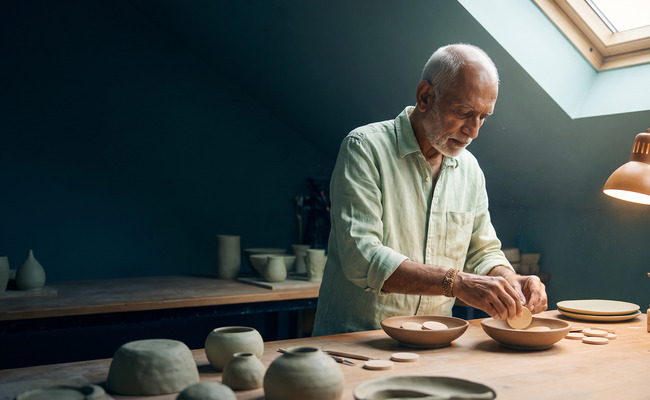 A man organizing several payment obligations after missed buy now pay later payments.