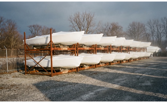 Wrapped boats stored on winter racks, an image of the exposure that lets creditors take money from a joint account you share.