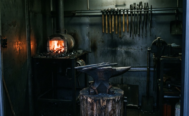 Two lengths of iron resting on an anvil beside a glowing forge, nearly identical until one is struck, the way two closing documents differ when you settle a debt before judgment.